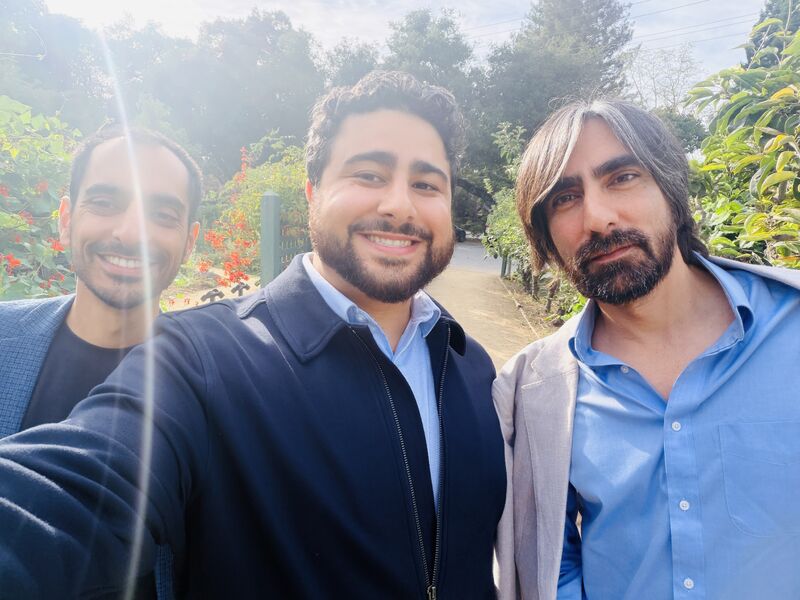 Milad Alucozai with two friends outdoors