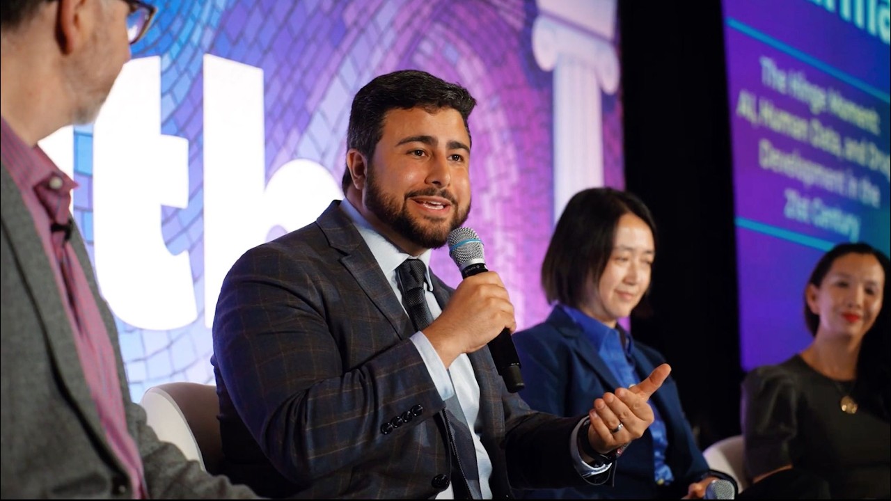 Milad Alucozai speaking on a panel at HLTH USA 2025